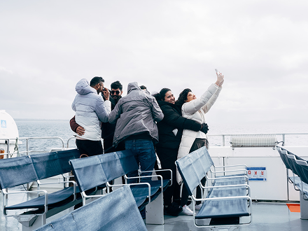 People celebrating on a boat